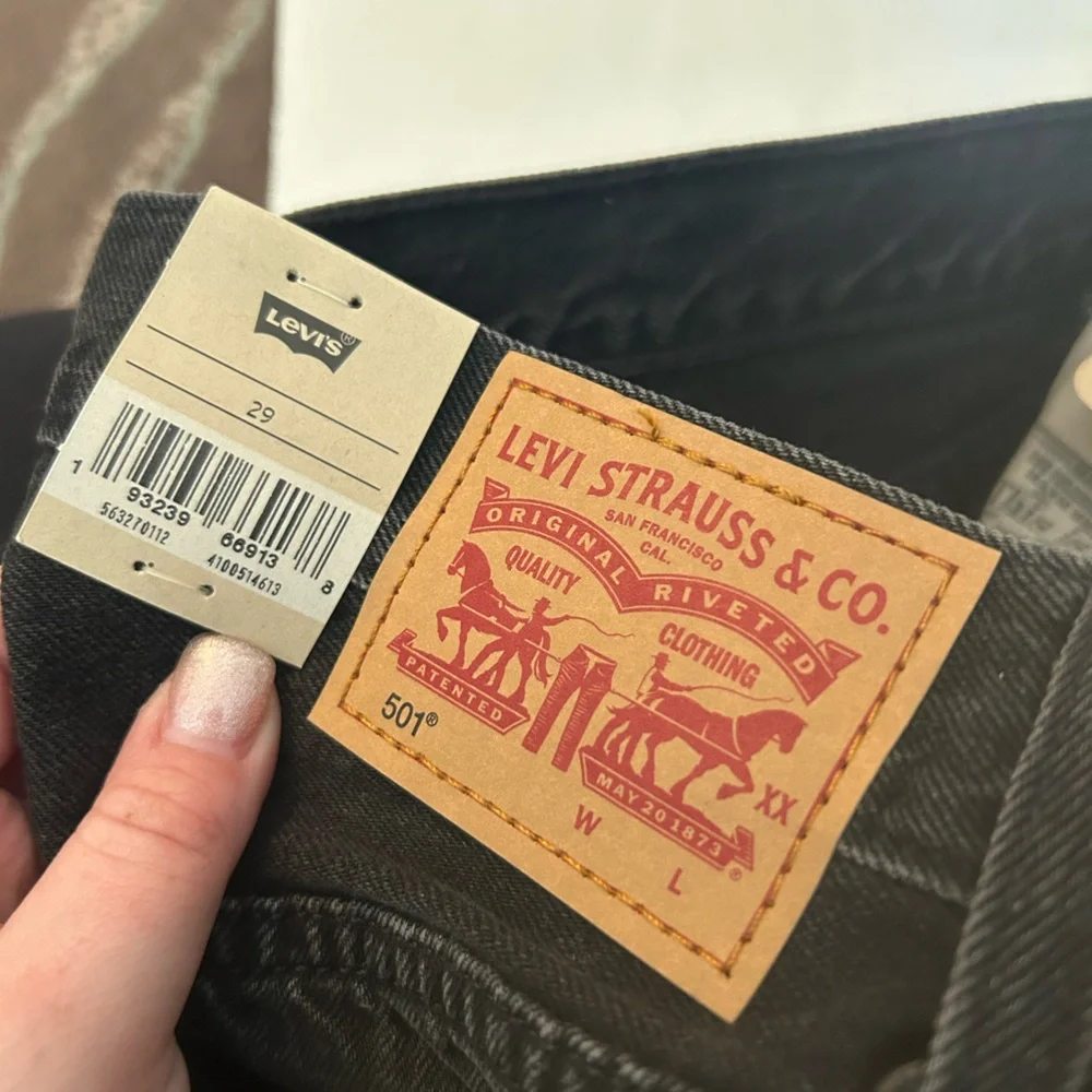 Levi’s NWT black 501 original fit high rise distressed black denim jean shorts